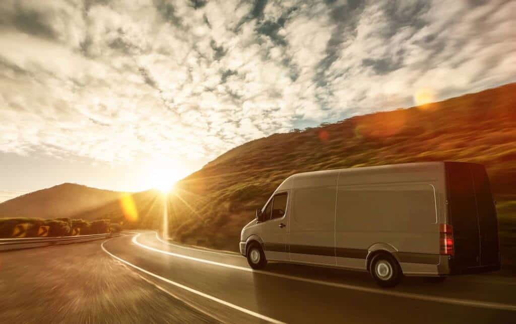 van driving into the sunset